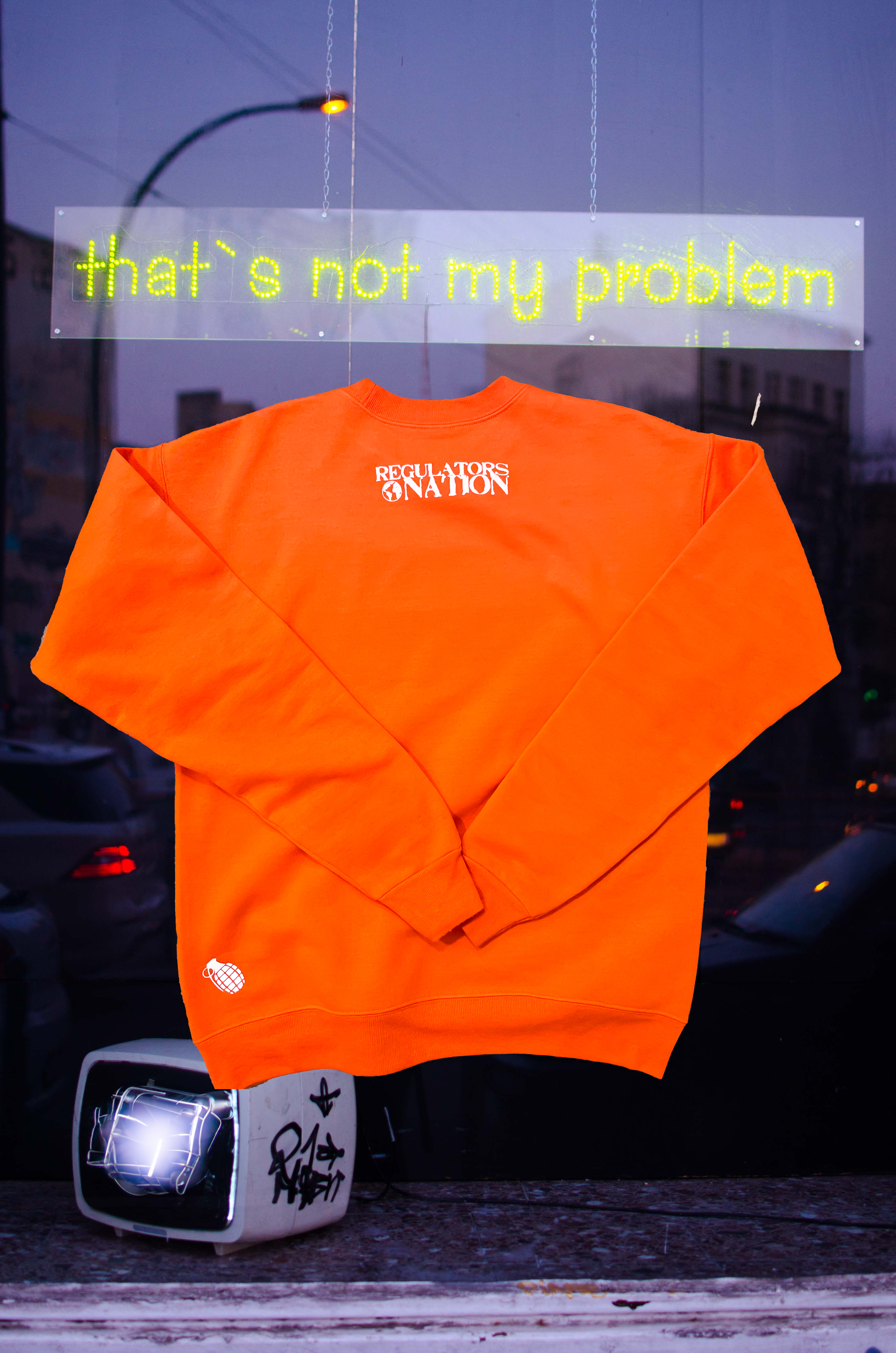 Regulators Bold Orange Crewneck Sweatshirt- Vibrant Streetwear Essential